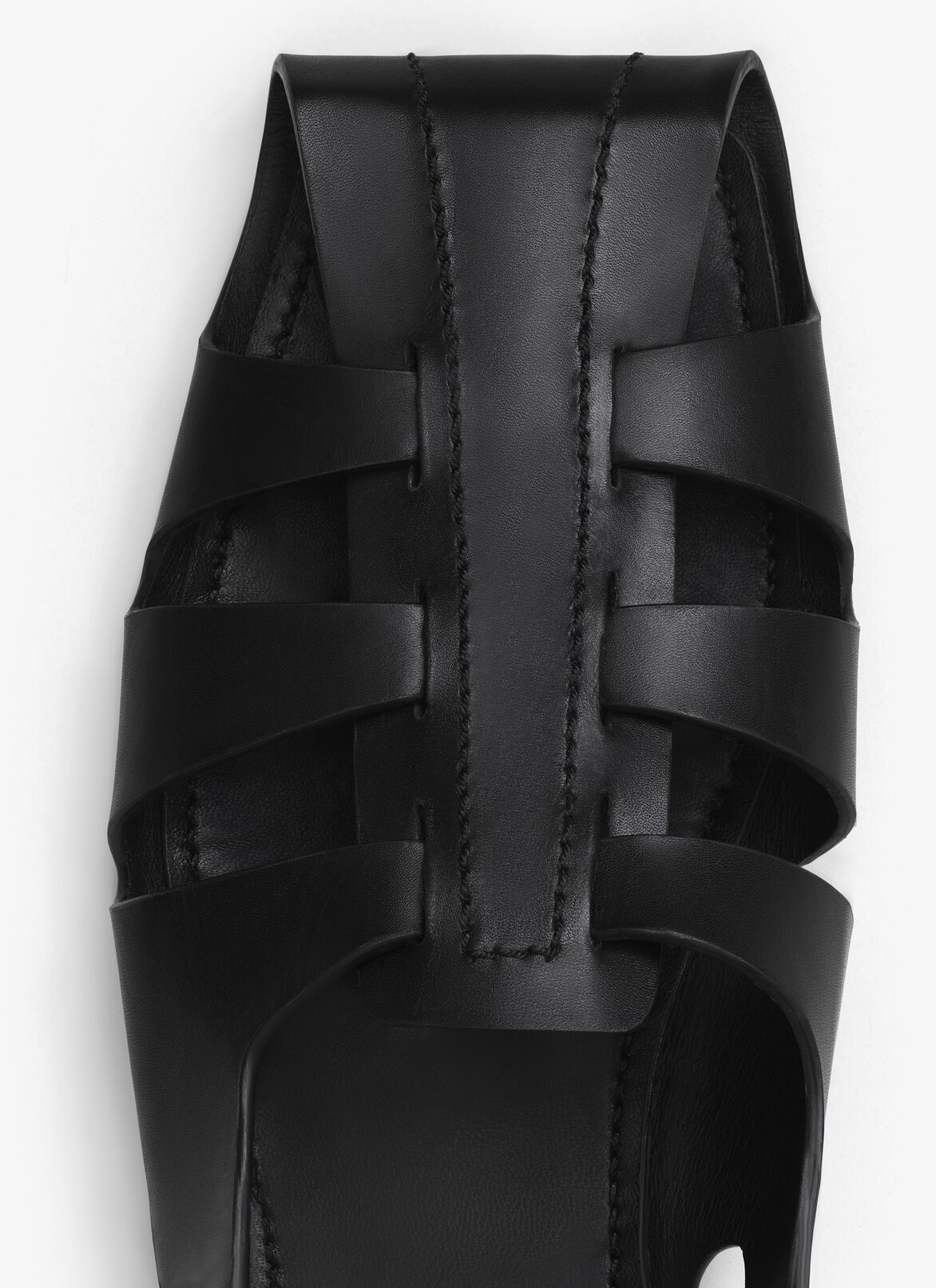 FOLDED FLAT SANDALS IN CALFSKIN ALAÏA BLACK FOLDED FLAT SANDALS IN CALFSKIN